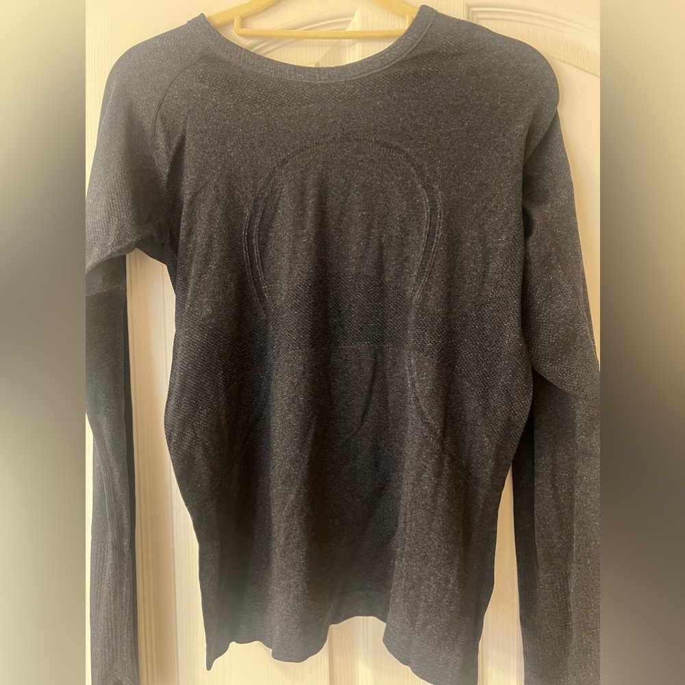 Lululemon shirt, dark grey. Riptag removed, but I think a size 6.